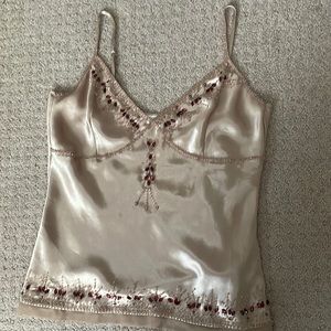 Medium cami with beaded details,nice when combined with low rise jeans